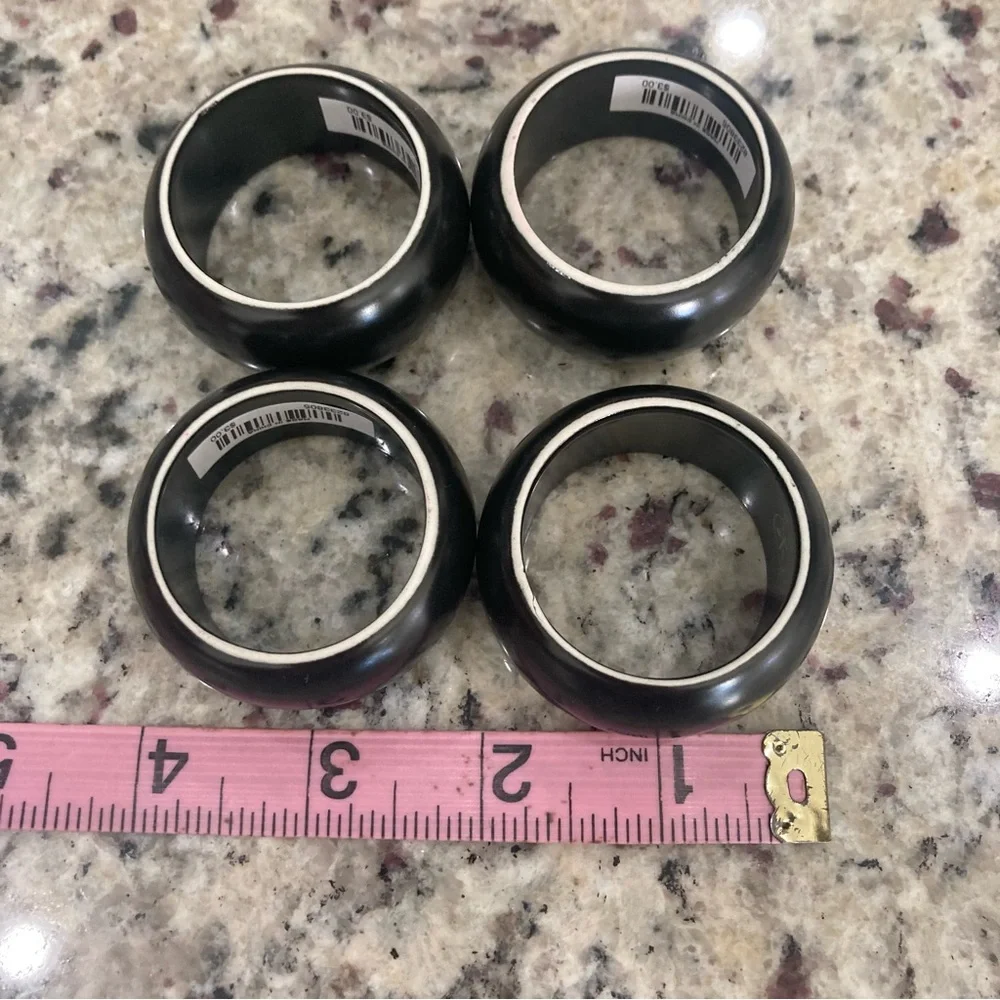 NWT Pier 1 Imports set of 4 black with white on one side ceramic napkin rings